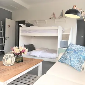 Gasthof 5 Options, Bloubergstrand